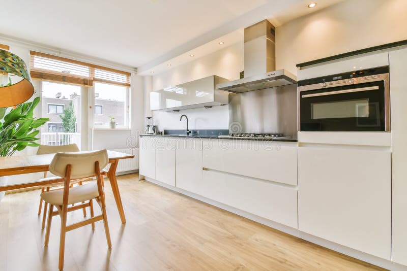 Cozy kitchen zone stock image. Image of fashionable 239083149