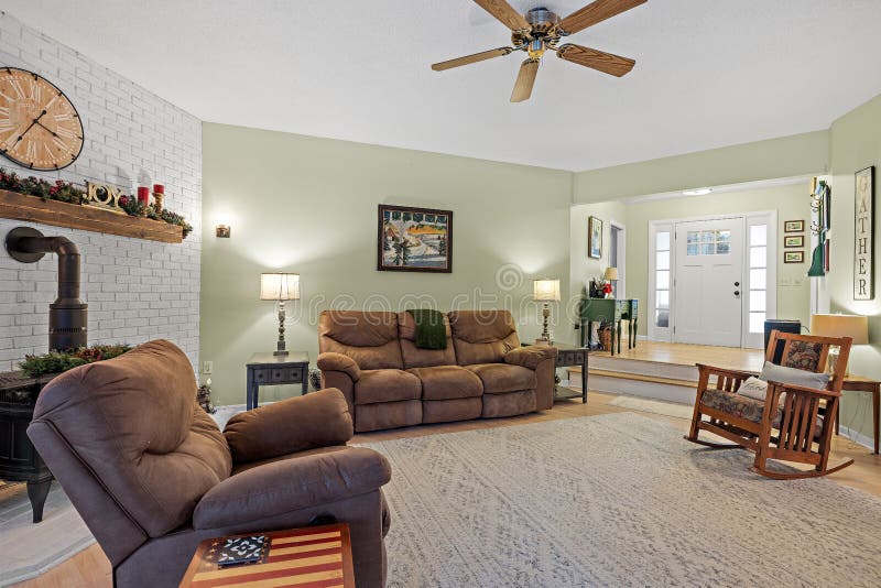 Cozy Living Room with a Brown Couch Stock Photo Image of cozy, home