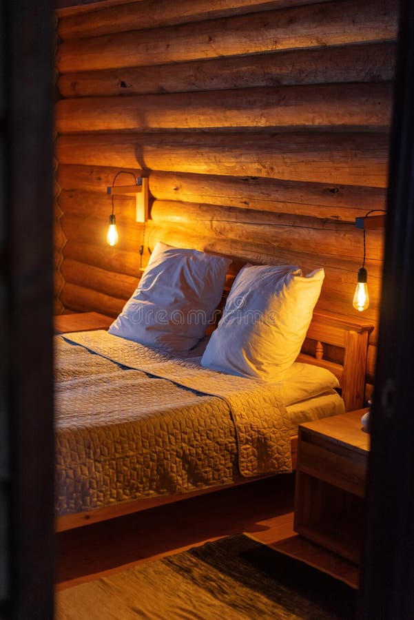 Cozy Log Cabin Bedroom Warm Lighting Stock Photos Free & RoyaltyFree