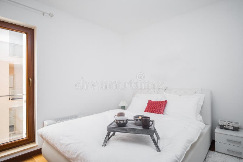 Cozy Morning. White Clean and Modern Bedroom with Empty Wall Stock