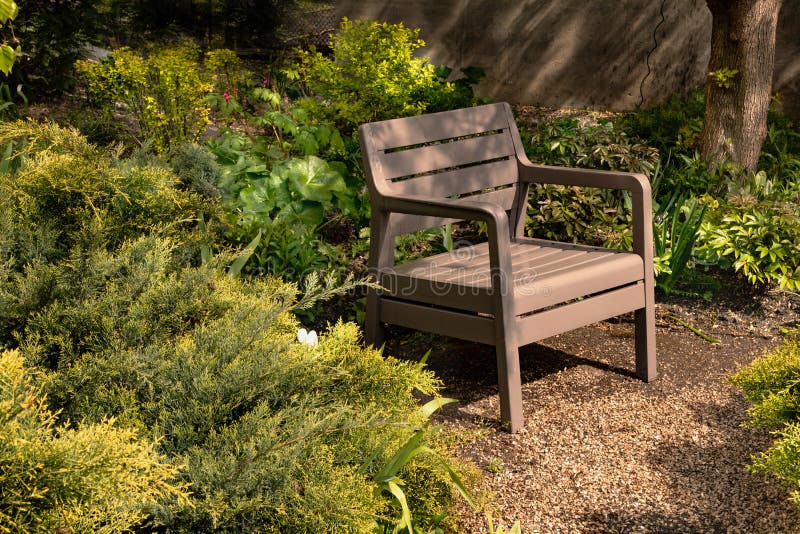 Plastic armchair in a garden