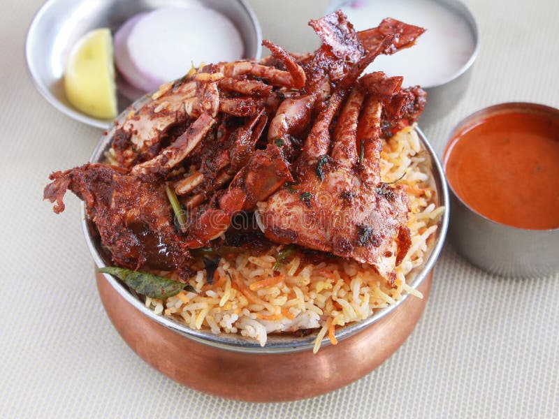 Deccan cuisine Hyderabad Crab biryani. This fragrant dum biryani will tingle your taste buds with its strong aroma and spicy flavor royalty free stock photos Deccan cuisine Hyderabad Crab biryani. This fragrant dum biryani will tingle your taste buds with its strong aroma and spicy flavor royalty free stock photos