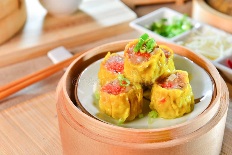 Crab Dumplings in chinese style in bamboo tray in asian restaurant stock photos Crab Dumplings in chinese style in bamboo tray in asian restaurant stock photos