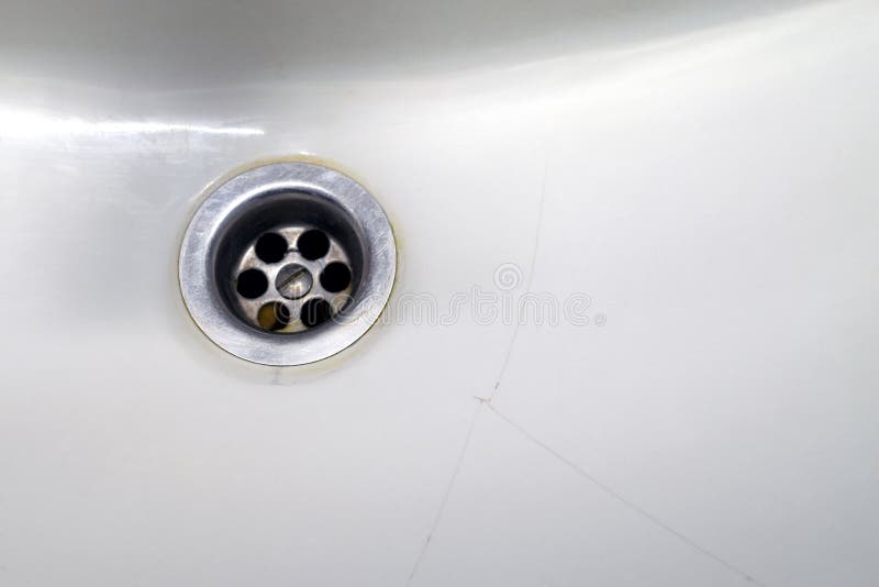 Crack in ceramic sink stock image. Image of porcelain 127593785