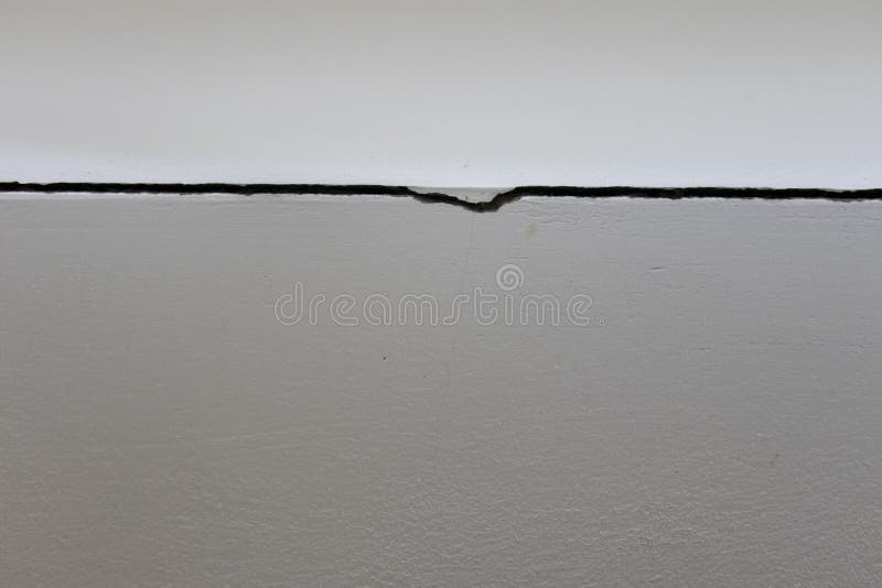 A Crack on the wall corner stock photo. Image of concrete 250551366