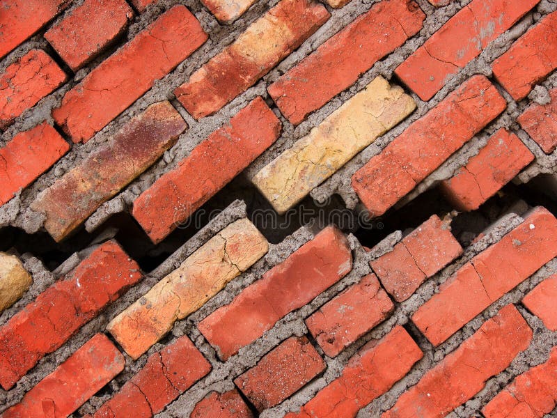 Crack in a wall of the house from a brick