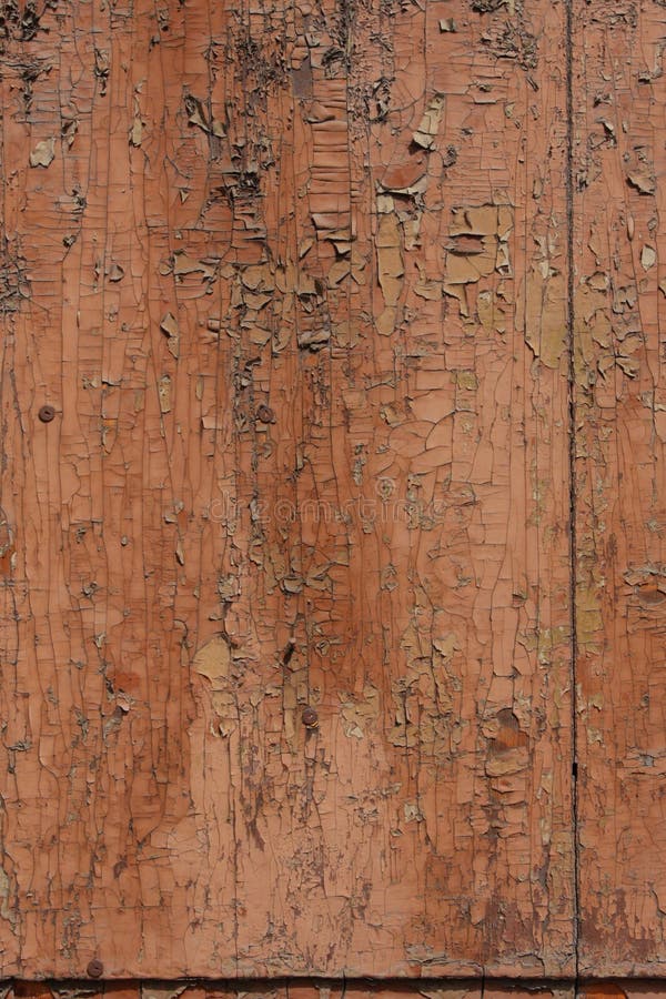 Cracked paint on wooden background texture