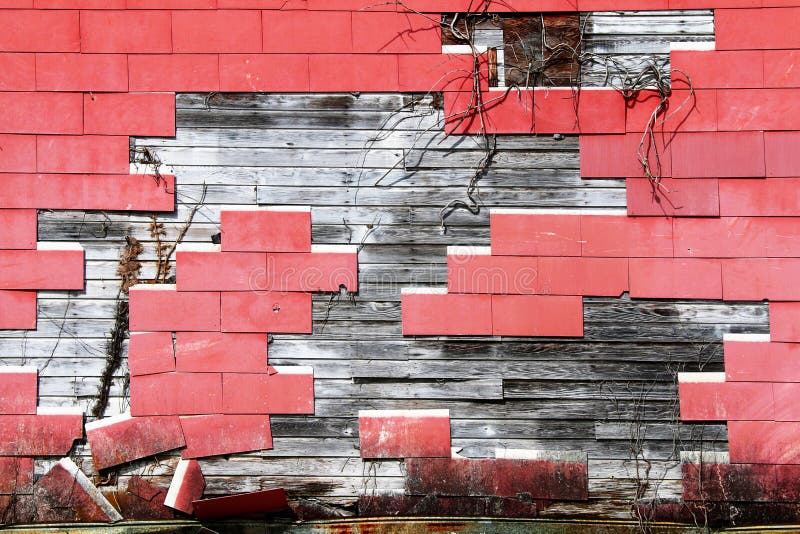 Cracked red shingle tile warehouse wall exposed rotten wood royalty free stock photos Cracked red shingle tile warehouse wall exposed rotten wood royalty free stock photos