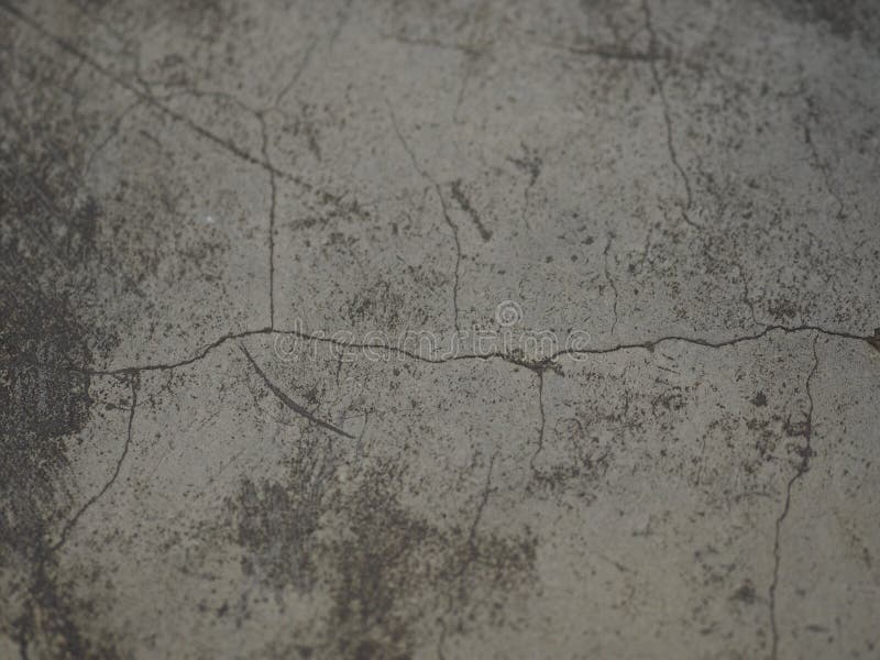Concrete Surrounding Wall, with a Gray Metallic Cladding Facade Behind, a  Concrete Sidewalk and an Asphalt Road in Front. Stock Image - Image of  background, architecture: 169167245