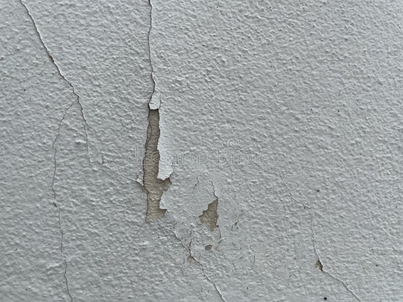 Cracks in the Walls Also Damage the Paint on the Walls. Stock Image