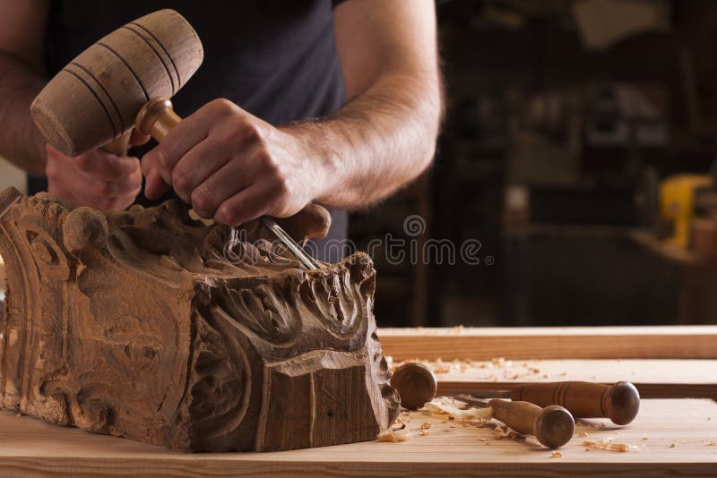 Craftsman carving wood stock image. Image of engraver 14523507