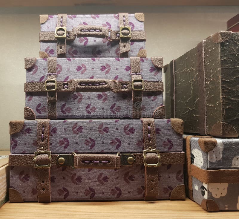 Craftsman makes miniature doll suitcases royalty free stock images