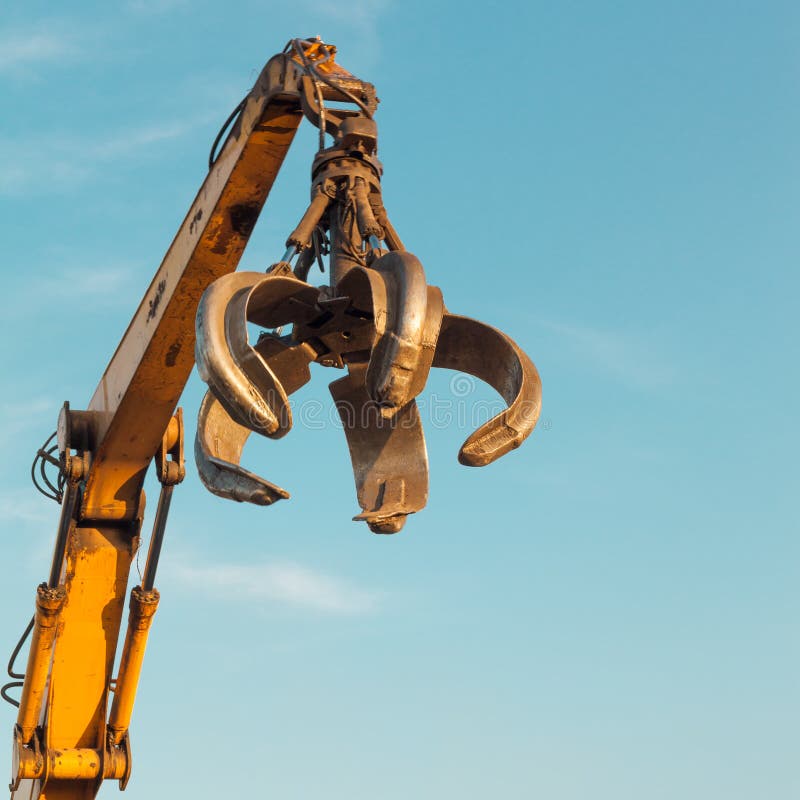 Crane arm with open claw stock photo. Image of copy, blue 49085766