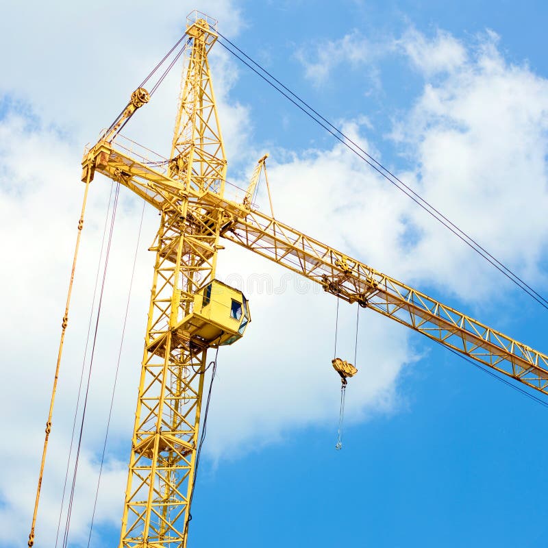 Crane on blue sky background