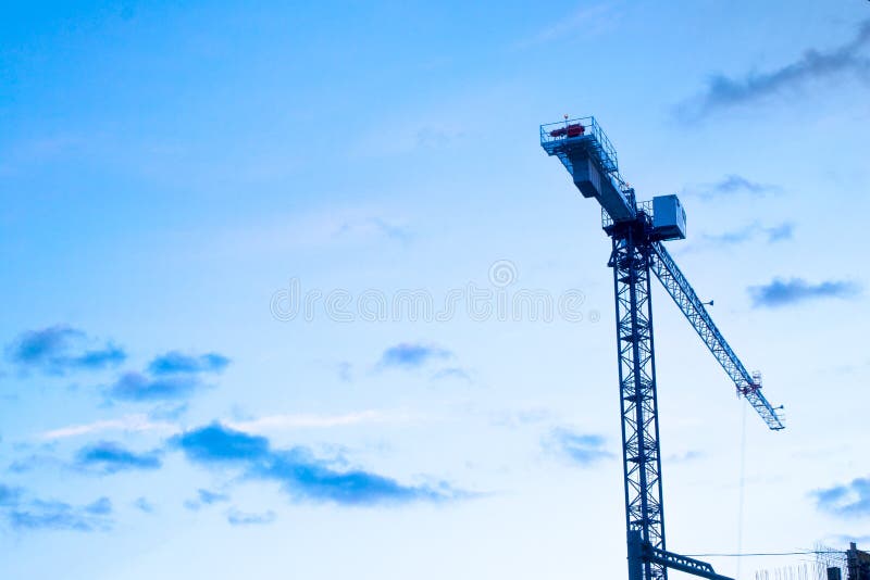 Crane builds a house or overpass within the third ring. royalty free stock photography