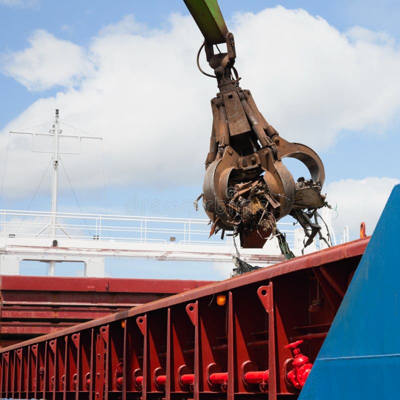 Crane Grabber Loading a Truck with Metal Scrap Stock Photo Image of