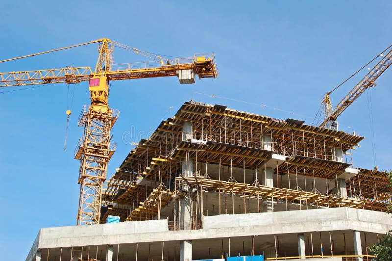 Crane and highrise construction site