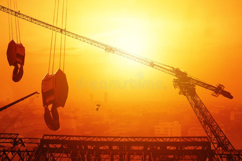 Crane hoist building city sunset royalty free stock photography Crane hoist building city sunset royalty free stock photography