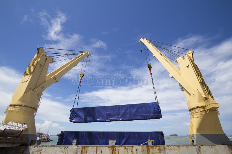 Crane Lifting Cargo Stock Photos Download 6,346 Royalty Free Photos
