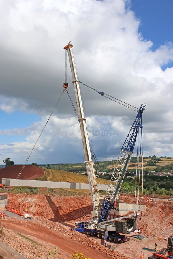 Crane Lifting a Concrete Bridge Beam Stock Photo Image of plant