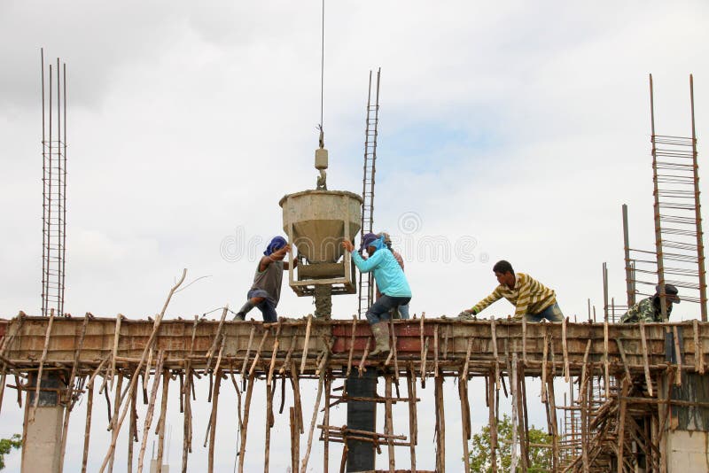 Crane lifting mixed concrete container royalty free stock photography Crane lifting mixed concrete container royalty free stock photography