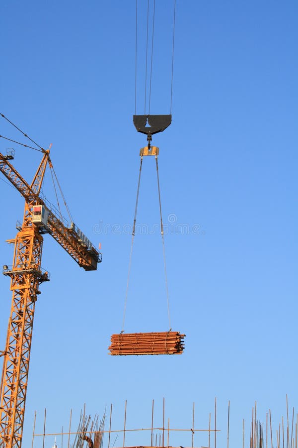 Crane lifting pieces of equipment. Load structural stock images, royalty-free photos and pictures