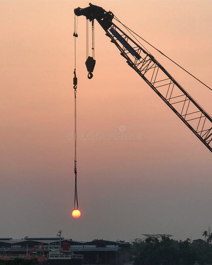 Crane lifting the sun stock photo. Image of phaya, crane 124174270
