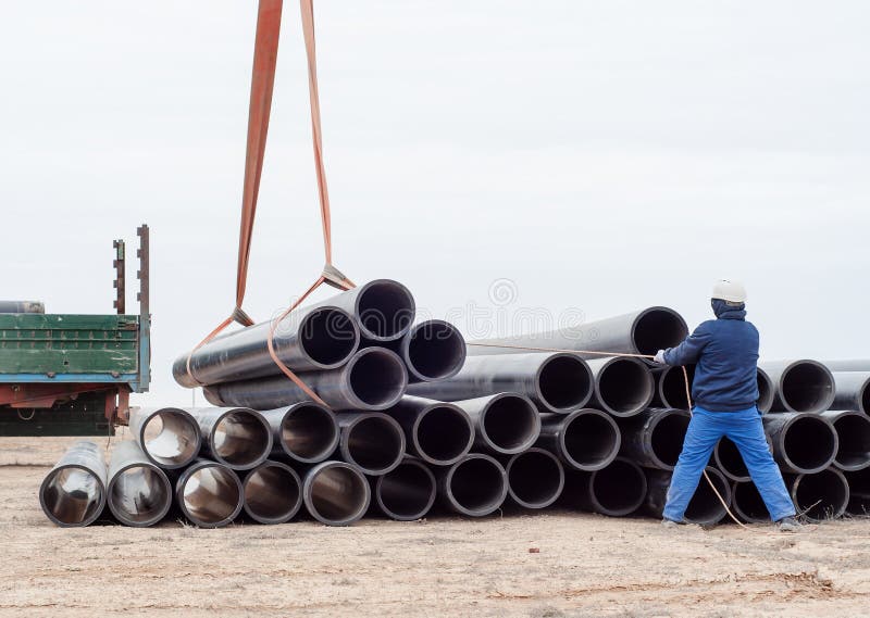 Crane works (pipes unloading)