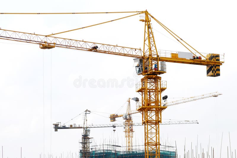 The cranes on construction site