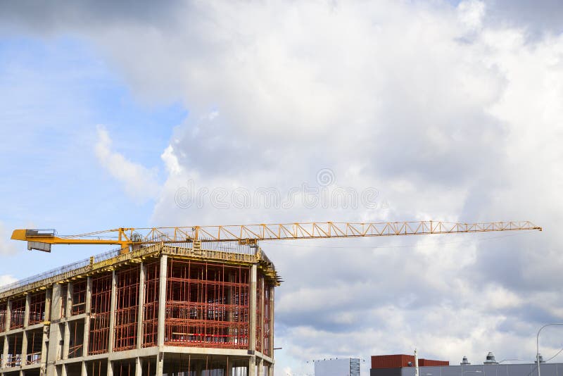 Cranes Over the House Under Construction .. Stock Photo Image of