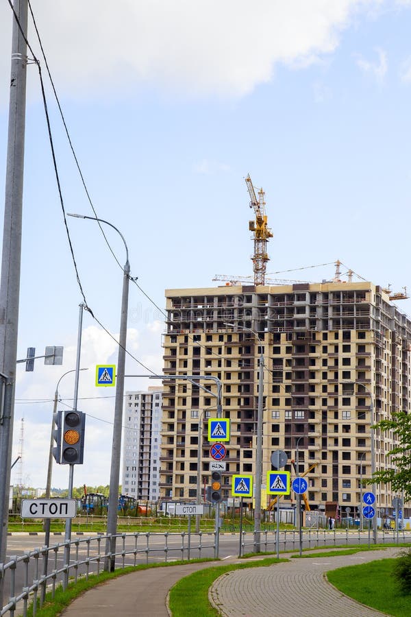 Cranes Over the House Under Construction .. Stock Photo Image of