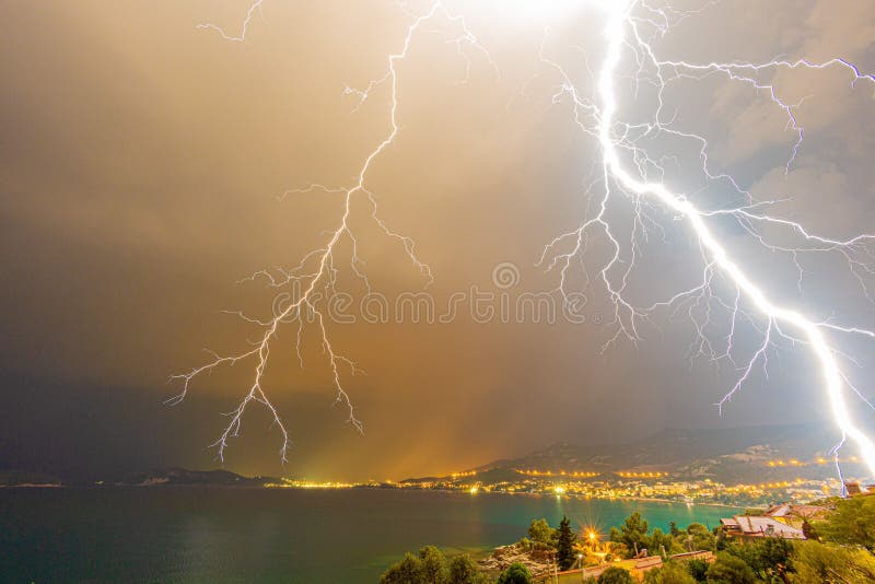 Crash of Thunder and Lightning Over the City among the Clouds through