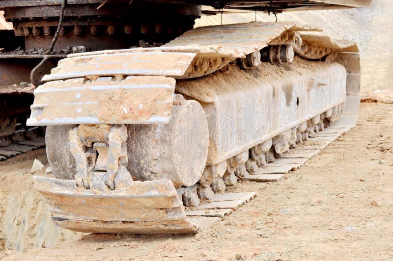 Crawler belt of the excavator on the construction site. Flame arrester stock images, royalty-free photos and pictures