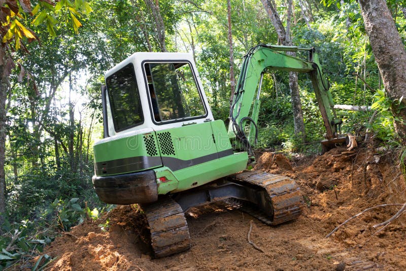 Crawler Excavator Digging on Mountain Equipment for Construction Stock