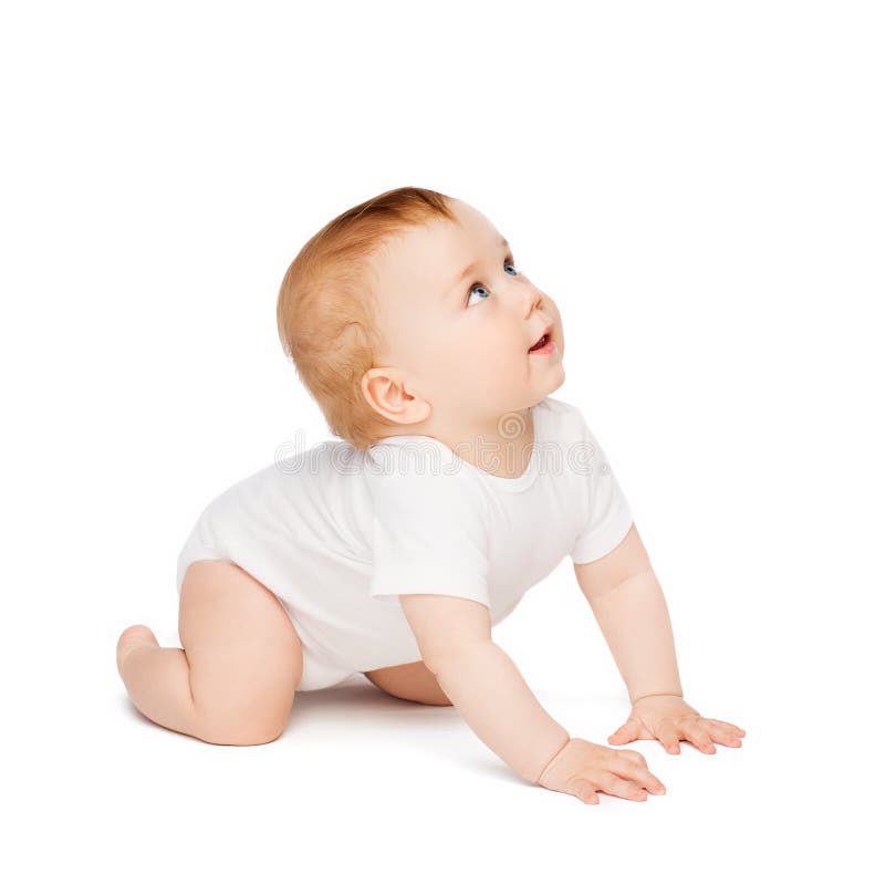 Crawling curious baby looking up stock photography