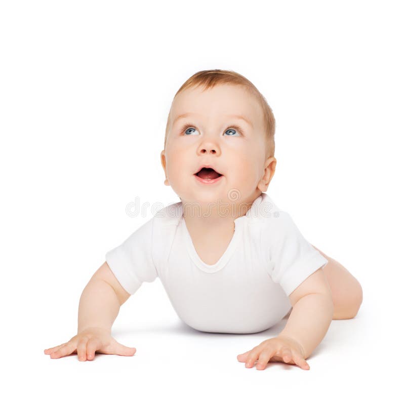 Crawling curious baby looking up stock photo