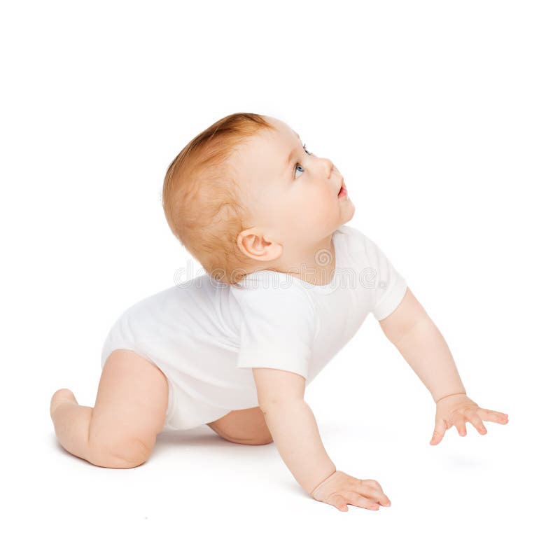 Crawling curious baby looking up royalty free stock photo