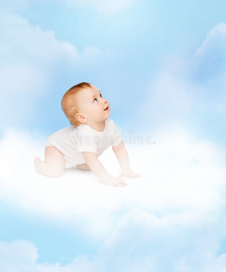 Crawling curious baby looking up royalty free stock image