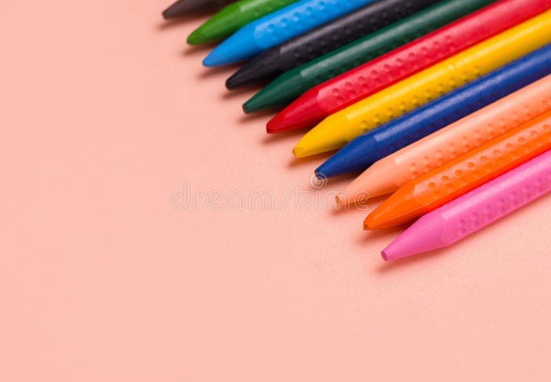 Crayons on a beige background. Copy space. drawing concept stock photography