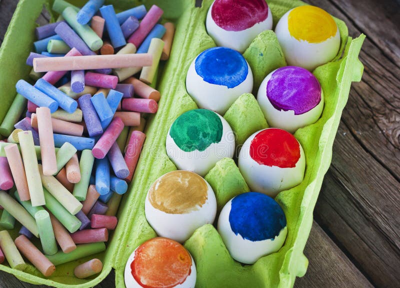 Crayons and colored eggs stock photo. Image of crayons 88103814