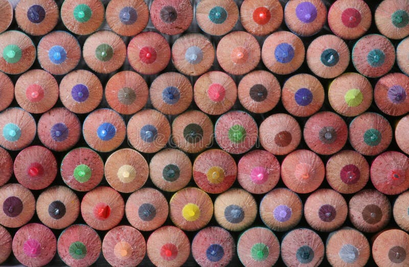 A macro close-up of colored pencils background. A macro close-up of colored pencils background