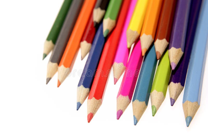 Colored pencils on white background. Colored pencils on white background