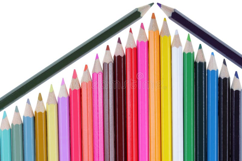 Colored pencils resembling a part of a house with a roof isolated on a white background. Colored pencils resembling a part of a house with a roof isolated on a white background