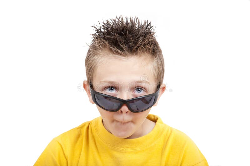 Crazy grimacing child with sunglasses