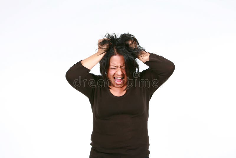 Crazy hispanic woman screaming and pulling hair