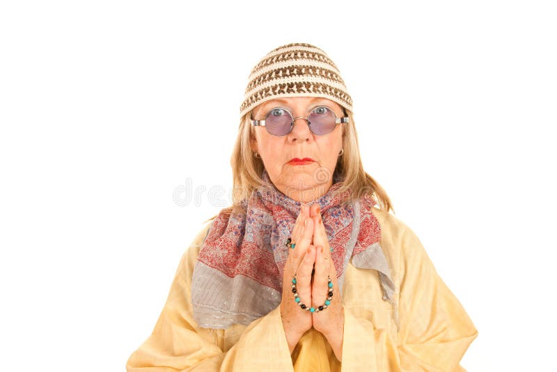 Crazy new age woman in a yellow robe royalty free stock images