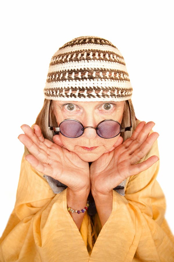 Crazy new age woman in a yellow robe royalty free stock photos