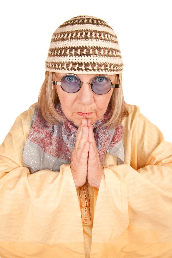 Crazy new age woman in a yellow robe stock images