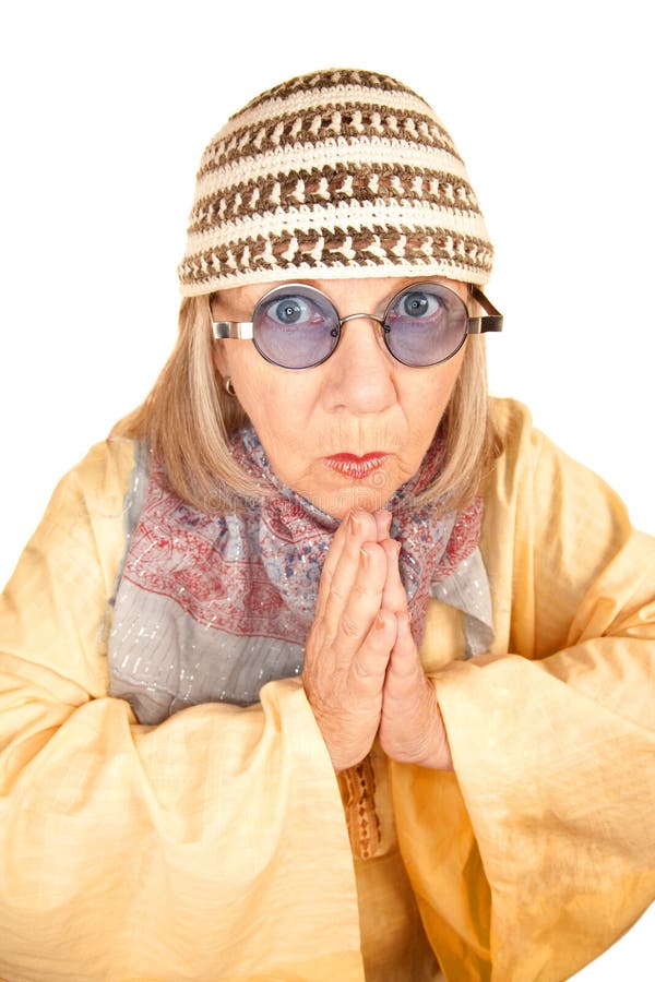 Crazy new age woman in a yellow robe stock images