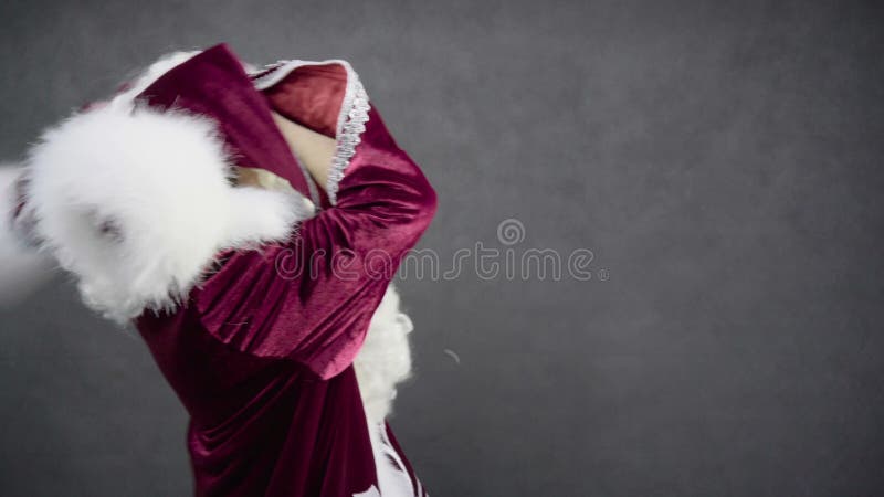 Crazy santa claus dancing and lost his hat